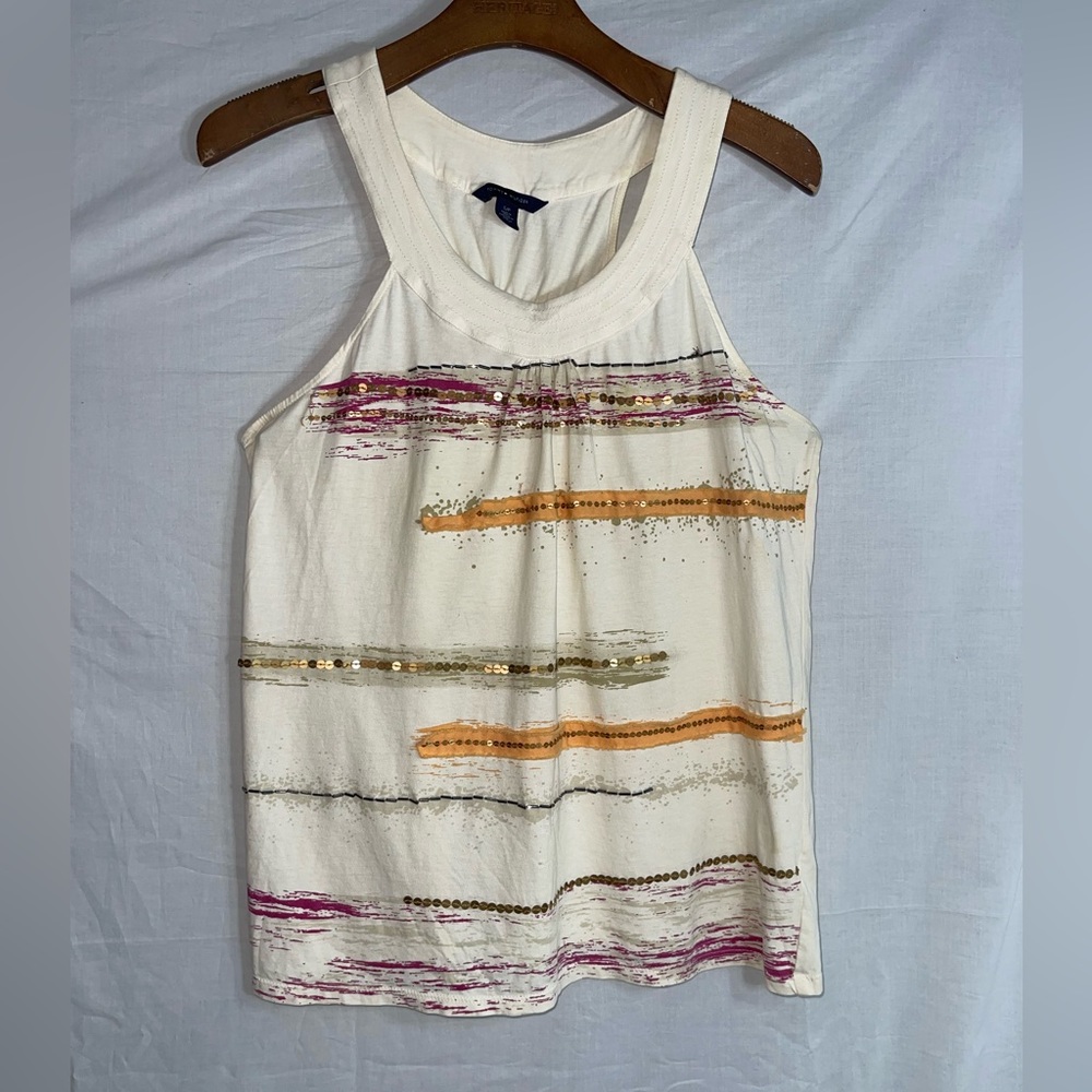 Tommy Hilfiger too baggie gold color not new but look like Normal wear Size S.
